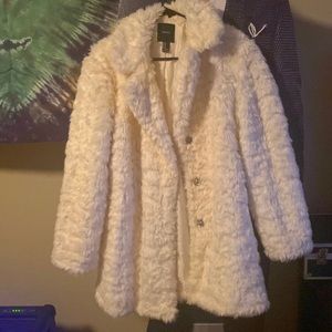 White faux fur coat